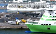 stock-footage-helsinki-finland-june-timelapse-view-cargo-trucks-pass-by-big-ferry-ship-bow-on-june