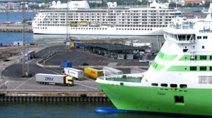 stock-footage-helsinki-finland-june-timelapse-view-cargo-trucks-pass-by-big-ferry-ship-bow-on-june