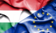 Waving flag of European Union and Hungary